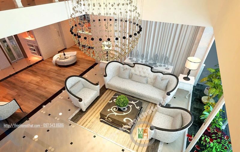 Phòng khách được thiết kế sang trọng với nội thất sofa bọc nỉ tân cổ điển có đường cong nhẹ nhàng ở thân ghế tạo ra sự ấn tượng.